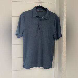 Travis Mathew navy polo